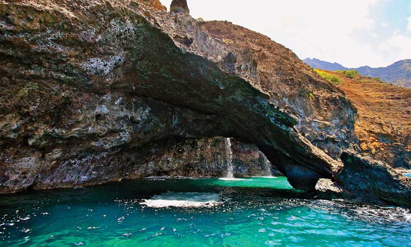 water next to the rock