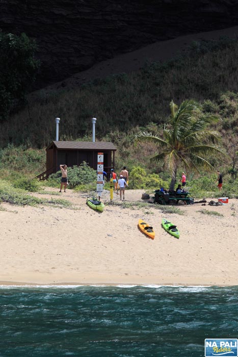 a group of people on a beach