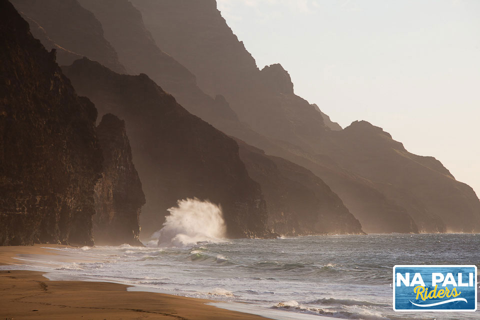 a beach with a mountain in the background